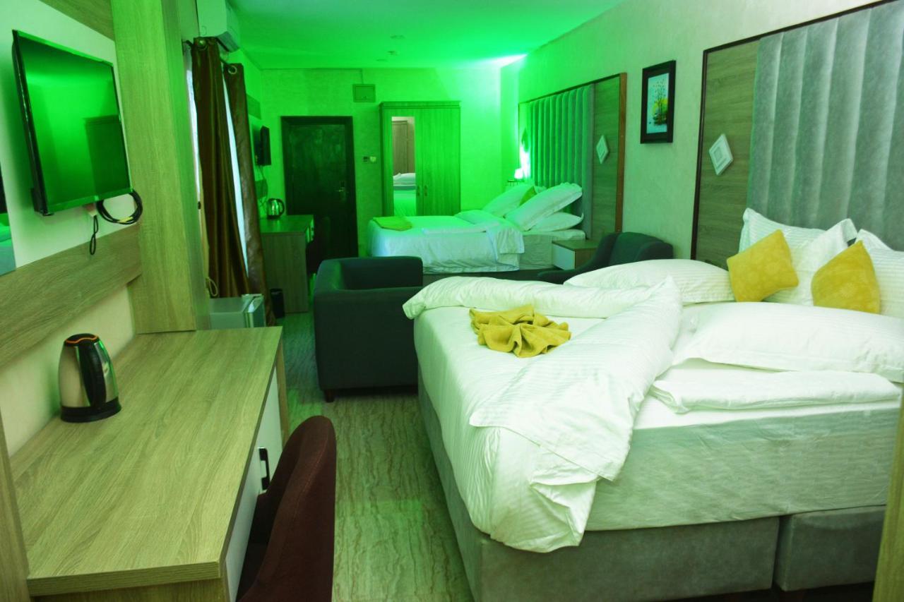 Vacation Villa Hotels And Suites Асаба Экстерьер фото